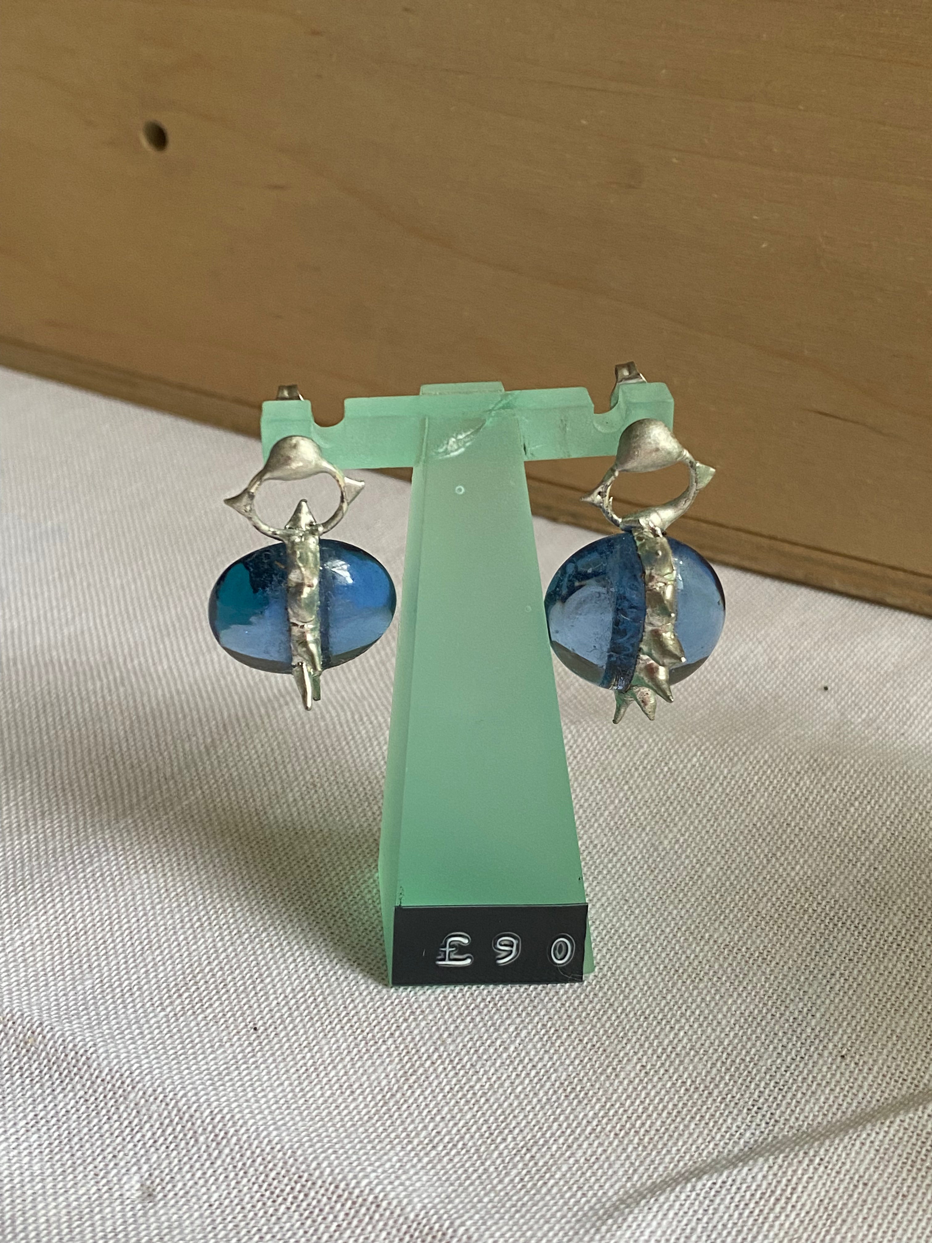 Light blue spiked earrings